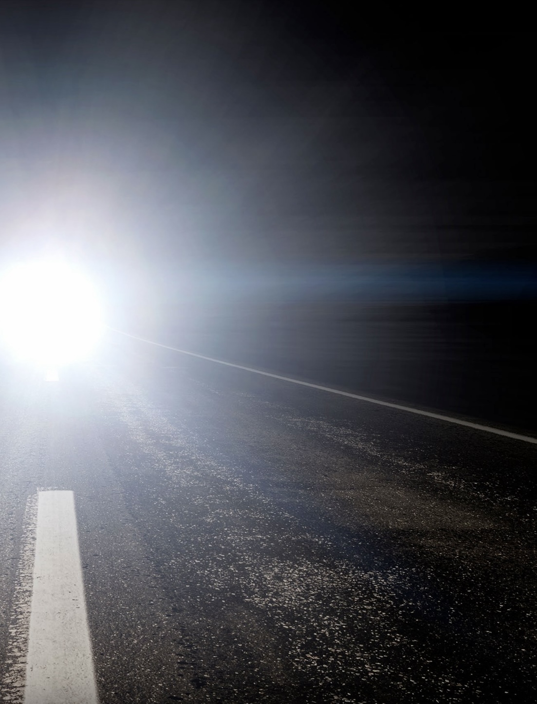 Car headlights in poem by Sandra sortwell makau